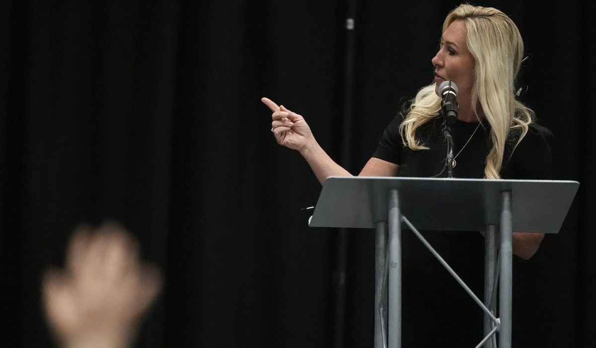 NextImg:Marjorie Taylor Greene laughs off protests, gives pro-Trump message at Georgia town hall