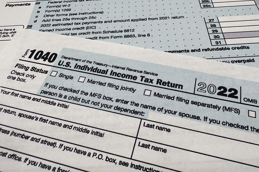 The Internal Revenue Service 1040 tax form for 2022 is seen on April 17, 2023. (AP Photo/Jon Elswick) **FILE**