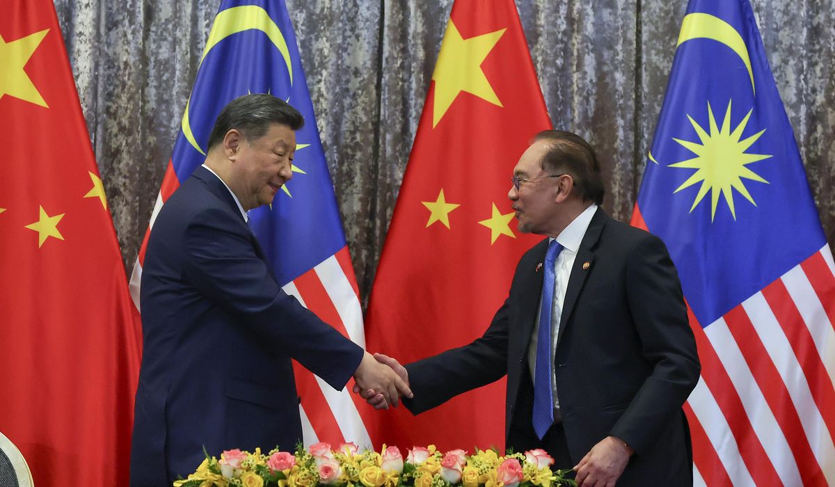 NextImg:Xi says China will stand with Southeast Asian countries in face of economic shocks