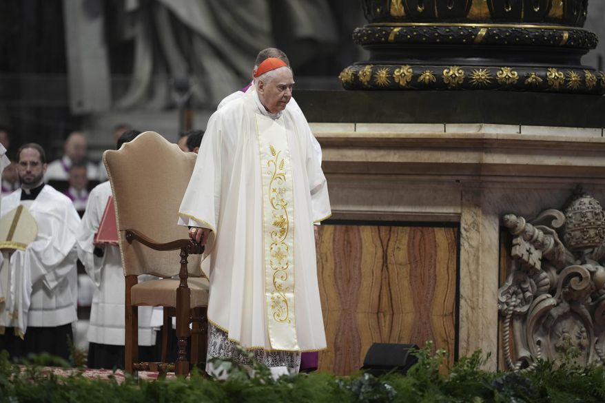 Delegate of the Holy Father, Cardinal Domenico Calcagno presides over the Chrism Mass inside St. Peter's Basilica at The Vatican, Thursday, April 17, 2025. (AP Photo/Andrew Medichini)