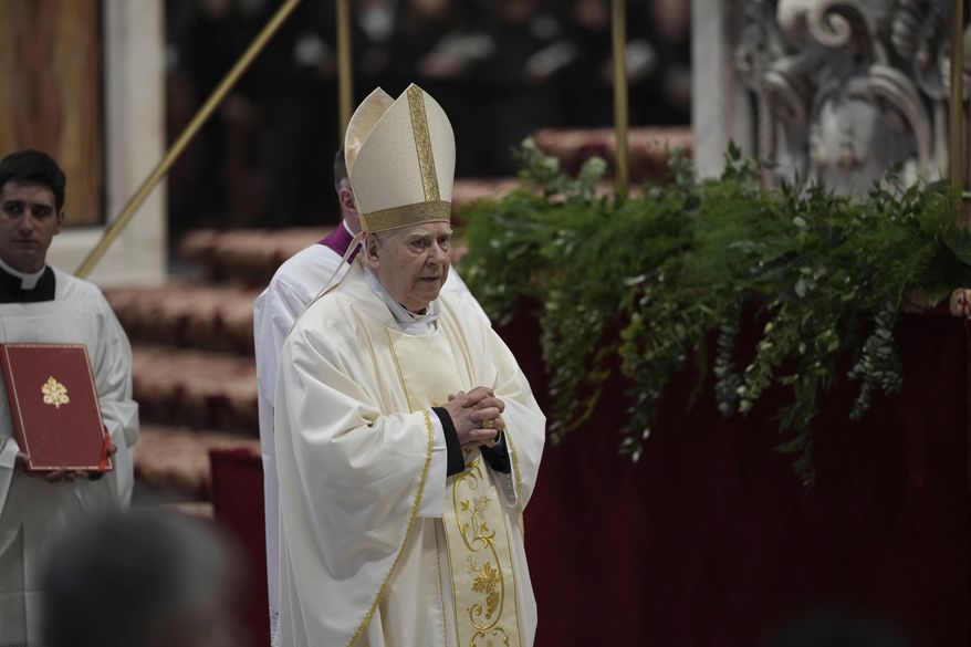 Delegate of the Holy Father, Cardinal Domenico Calcagno, presides over the Chrism Mass inside St. Peter's Basilica at The Vatican, Thursday, April. 17, 2025. (AP Photo/Andrew Medichini)