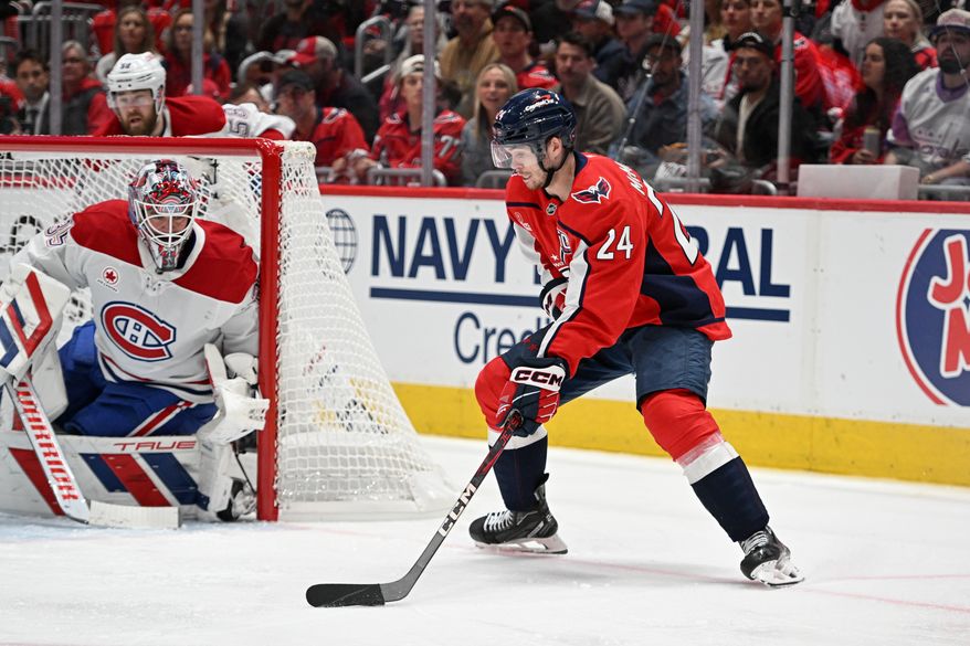 Washington Capitals center Connor McMichael (24) lining up a shot during the second period of an NHL playoff game against the Montreal Canadiens at Capital One Arena in Washington D.C., April 23, 2025. McMichael would score on the play. (Photo for the Washington Times)