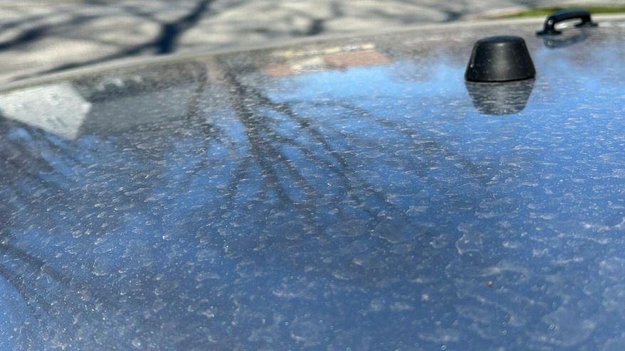 Dirt and dust originating 2,000 miles away in the desert Southwest, is seen on the windshield of a car in Portland, Maine, after being carried by wind and mixing with rain Saturday, April 19, 2025. (Mike Hartford/WGME-TV via AP)