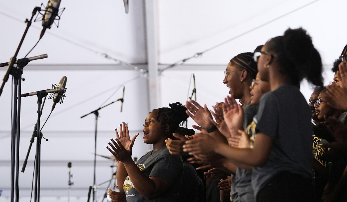 NextImg:Student gospel singers take stage at New Orleans festival known for celebrity acts