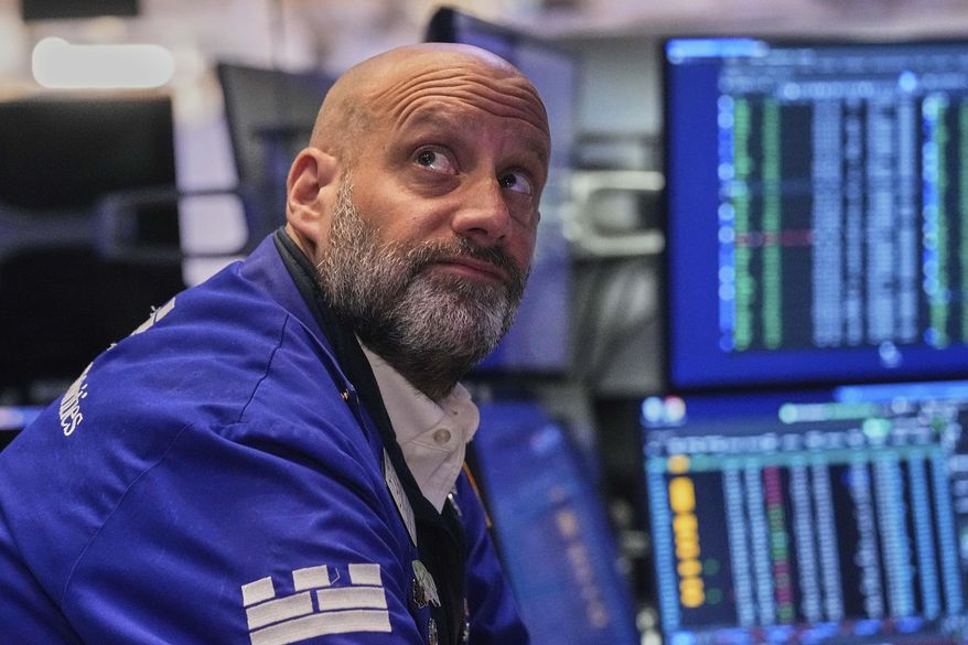 Specialist Meric Greenbaum works on the floor of the New York Stock Exchange, Friday, April 25, 2025. (AP Photo/Richard Drew)
