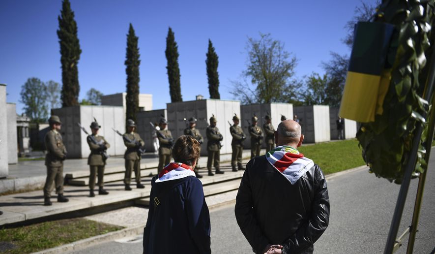 People take part in a ceremony to mark Liberation Day in Turin, Italy, Friday, April 25, 2025. (Alberto Gandolfo/LaPresse via AP)