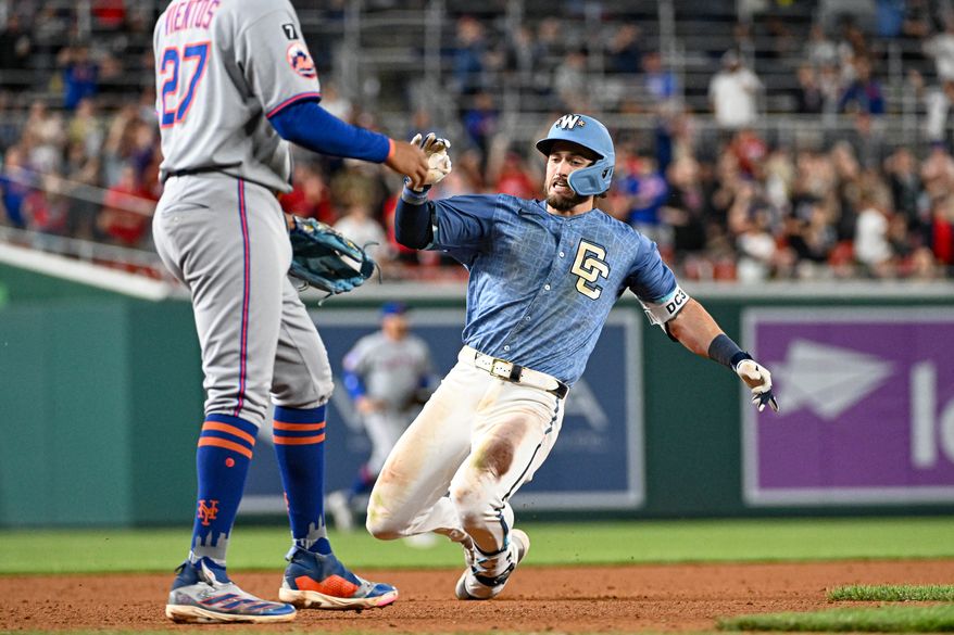 Washington Nationals right fielder Dylan Crews (3) sliding into third after hitting a triple during the ninth inning of an MLB game against the New York Mets at Nationals Park in Washington D.C., April 25, 2025. (Photo by All-Pro Reels for Washington Times Sports)