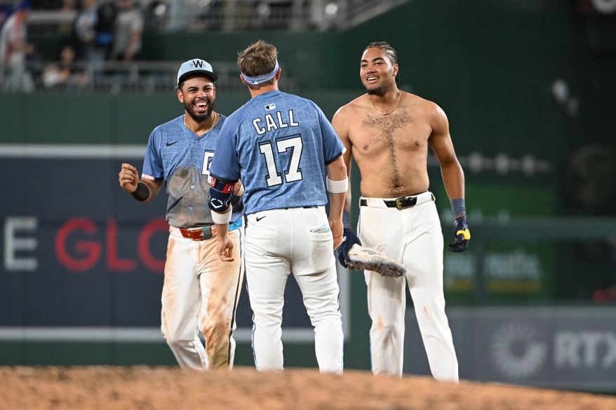 Washington Nationals designated hitter James Wood (29) (right) celebrating with teammates Luis Garcia (2) and Alex Call (17) after hitting a game-winning, walkoff single during the ninth inning of an MLB game against the New York Mets at Nationals Park in Washington D.C., April 25, 2025. (Photo by All-Pro Reels for Washington Times Sports)