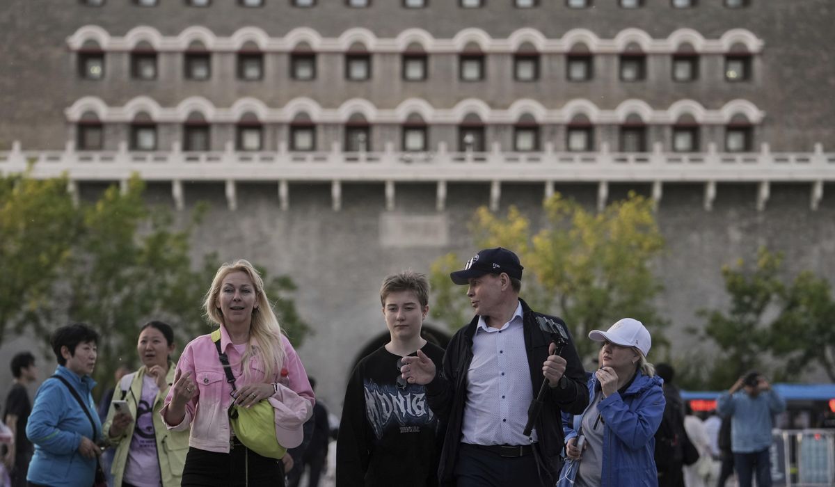 NextImg:China lowers minimum amount for tax refunds for tourists to boost spending