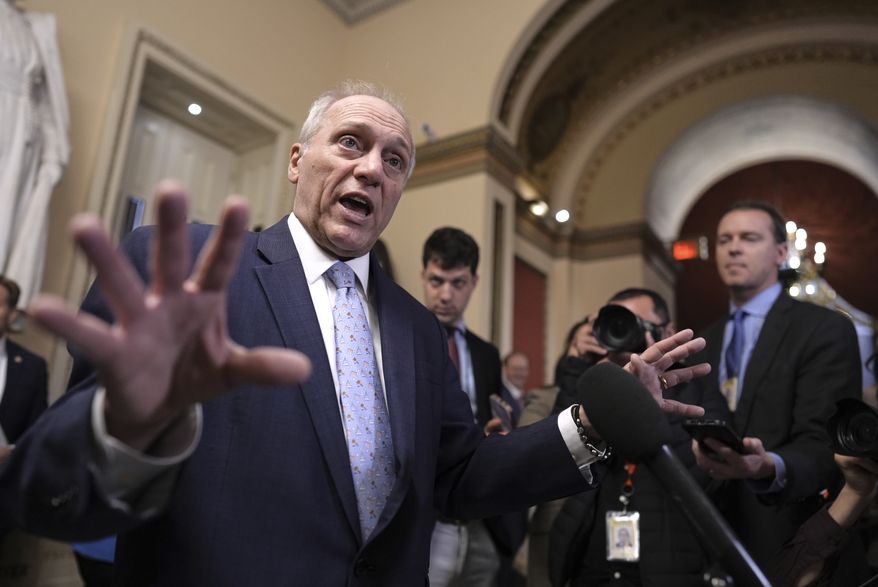 House Majority Leader Steve Scalise, R-La., talks to reporters just after House Republicans narrowly approved their budget framework, at the Capitol in Washington, Thursday, April 10, 2025. (AP Photo/J. Scott Applewhite)