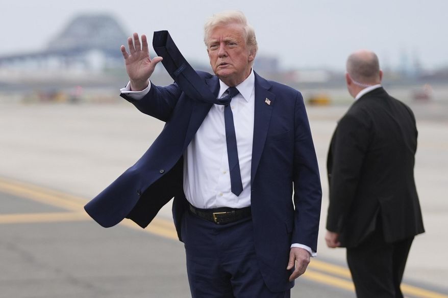 President Donald Trump waves as he arrives at Newark Liberty International Airport in Newark, N.J., Saturday, April 26, 2025, upon returning from a trip to attend the funeral of Pope Francis at the Vatican. (AP Photo/Evan Vucci) **FILE**