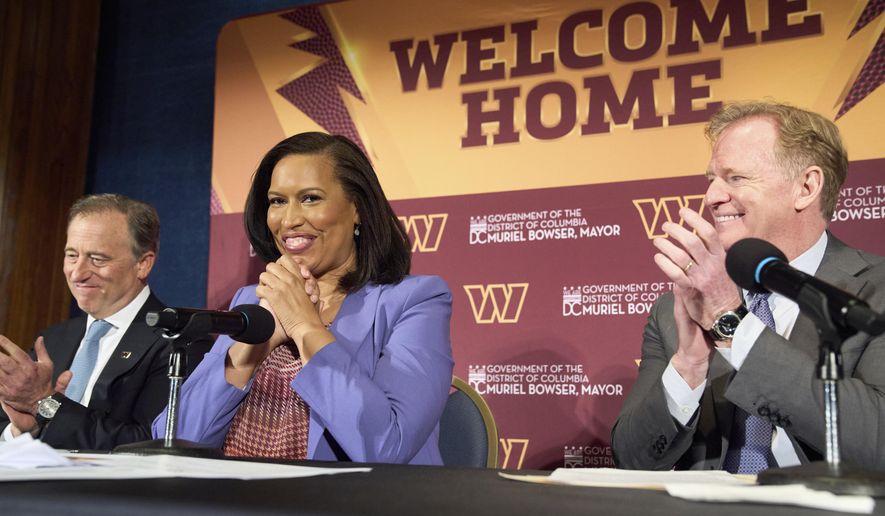Washington Commanders controlling owner Josh Harris, from left, District of Columbia Mayor Muriel Bowser and NFL Commissioner Roger Goodell announce a new home for the NFL football team on the site of the old RFK Stadium, Monday, April 28, 2025, at the National Press Club in Washington. (AP Photo/Jacquelyn Martin)