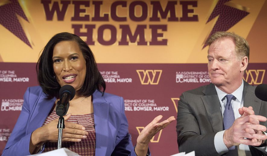 District of Columbia Mayor Muriel Bowser gestures toward NFL Commissioner Roger Goodell as they announce a new home for the NFL football team on the site of the old RFK Stadium, Monday, April 28, 2025, at the National Press Club in Washington. (AP Photo/Jacquelyn Martin) ** FILE **