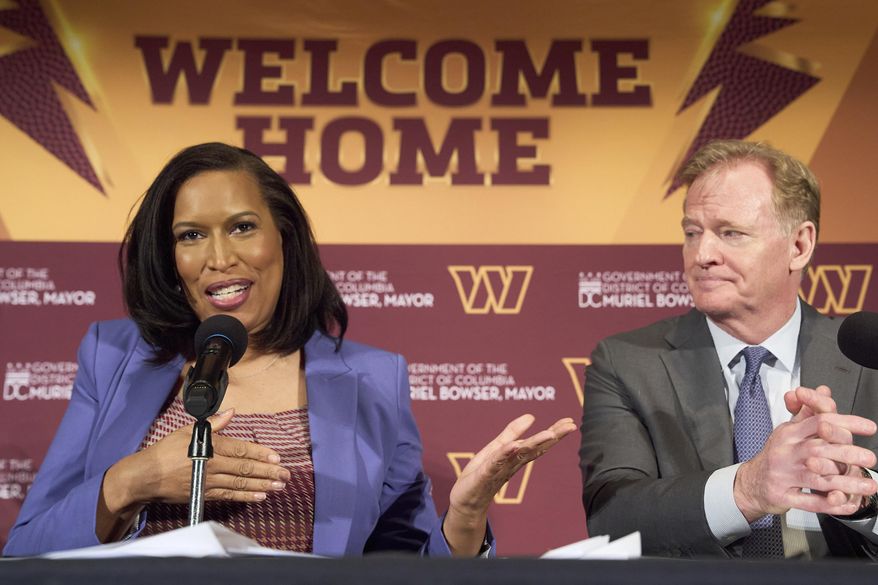 District of Columbia Mayor Muriel Bowser gestures toward NFL Commissioner Roger Goodell as they announce a new home for the NFL football team on the site of the old RFK Stadium, Monday, April 28, 2025, at the National Press Club in Washington. (AP Photo/Jacquelyn Martin) ** FILE **
