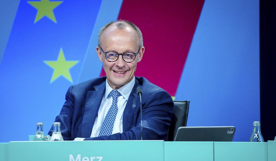 Friedrich Merz, CDU candidate for chancellor and federal CDU chairman, attends the CDU federal committee in Berlin, Monday, April 28, 2025. (Kay Nietfeld/dpa via AP)