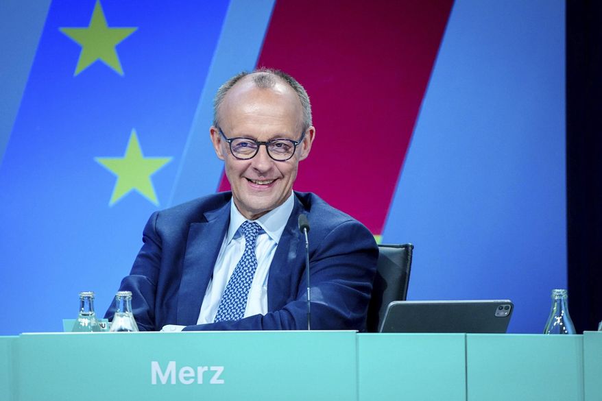 Friedrich Merz, CDU candidate for chancellor and federal CDU chairman, attends the CDU federal committee in Berlin, Monday, April 28, 2025. (Kay Nietfeld/dpa via AP)