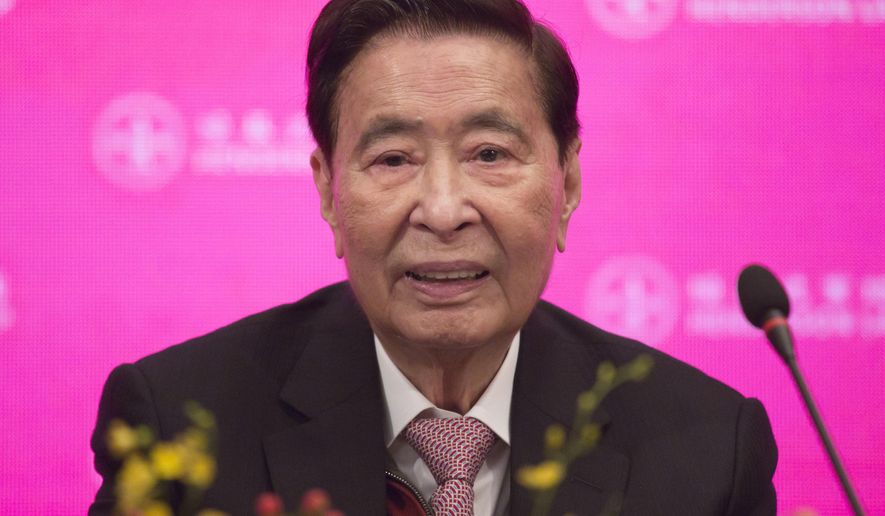 FILE - Henderson Land Development's founder and chairman Lee Shau Kee attends a news conference as he announces his retirement after the company's general meeting in Hong Kong, Tuesday, May 28, 2019. (AP Photo/Kin Cheung, file)