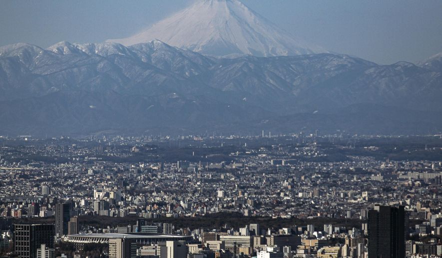 FILE - Mount Fuji is viewed, Jan. 29, 2021, in Tokyo. (AP Photo/Kiichiro Sato, file)