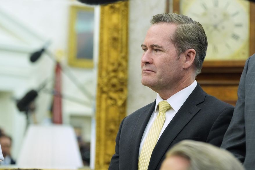 White House national security adviser Mike Waltz listens as President Donald Trump meets with Italy's Prime Minister Giorgia Meloni in the Oval Office of the White House, Thursday, April 17, 2025, in Washington. (AP Photo/Alex Brandon)