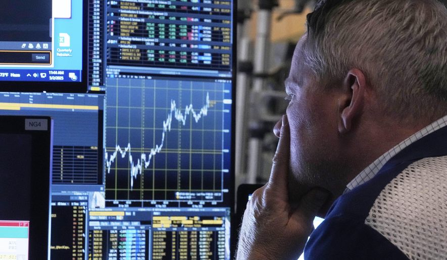 Trader Rob Taylor works on the floor of the New York Stock Exchange, Friday, May 2, 2025. (AP Photo/Richard Drew)