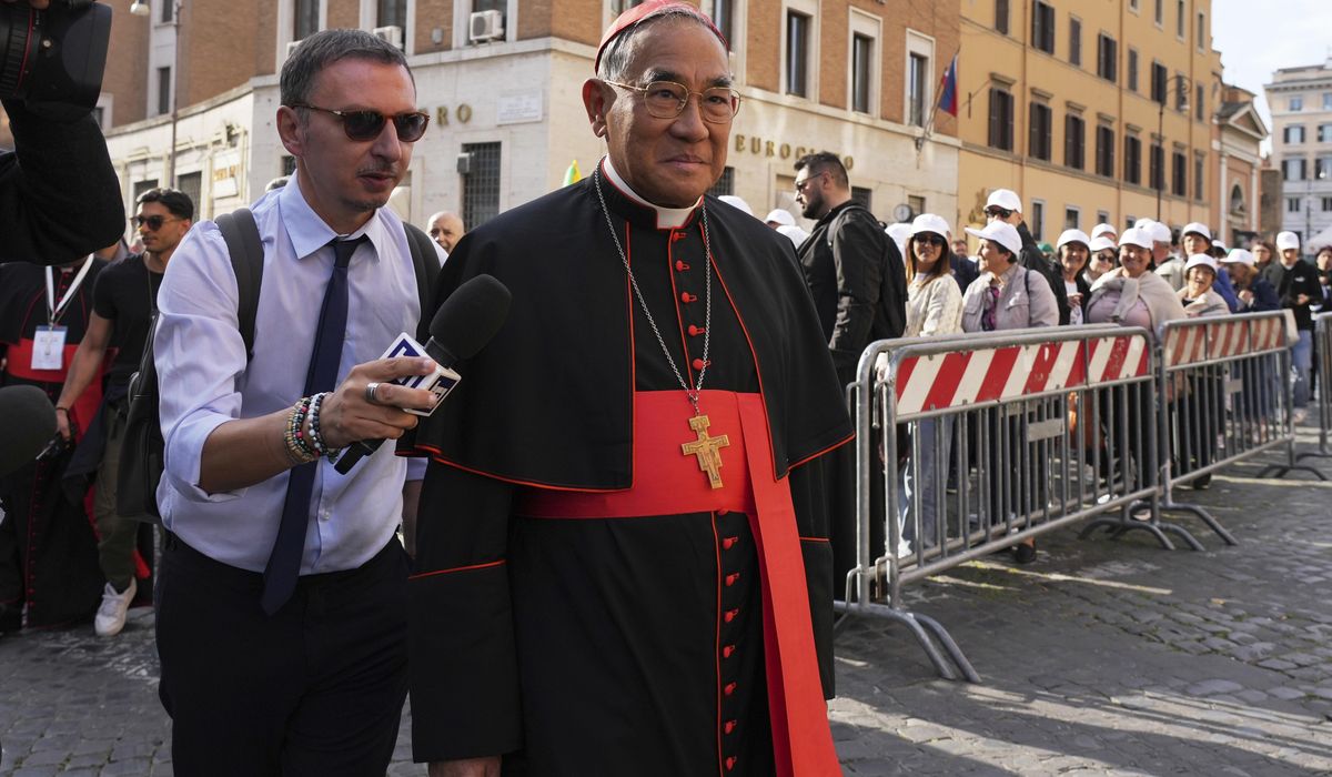 NextImg:Vatican workers install Sistine Chapel stove where ballots are burned during conclave to elect pope