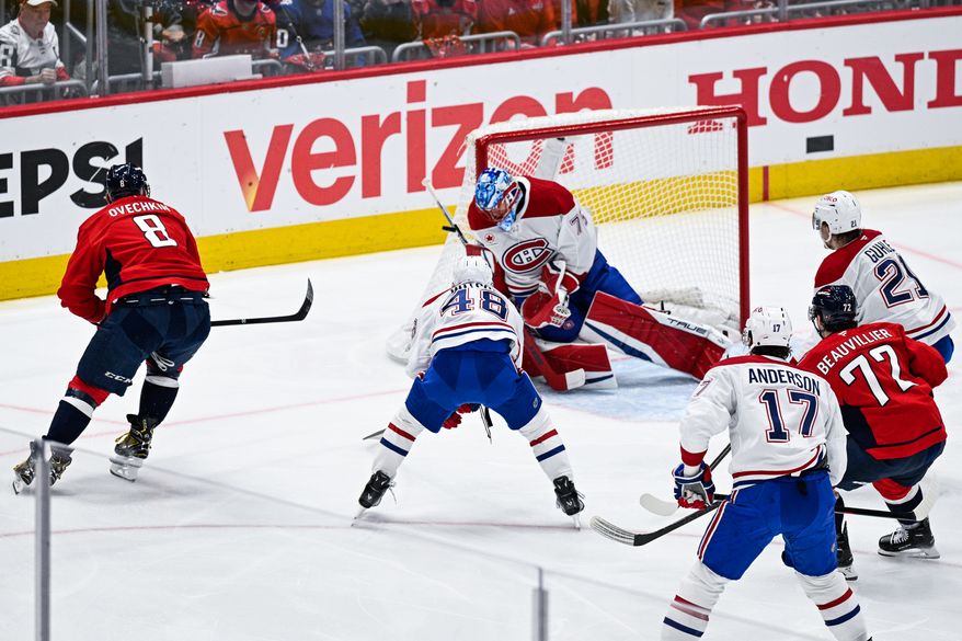 Montreal Canadiens goalie Jakub Dobes (75) blocks a shot attempt by Washington Capitals left wing Alex Ovechkin (8) during the first period at Capital One Arena, Washington, D.C., April 30, 2025. (Photo by Brian Murphy for the Washington Times)