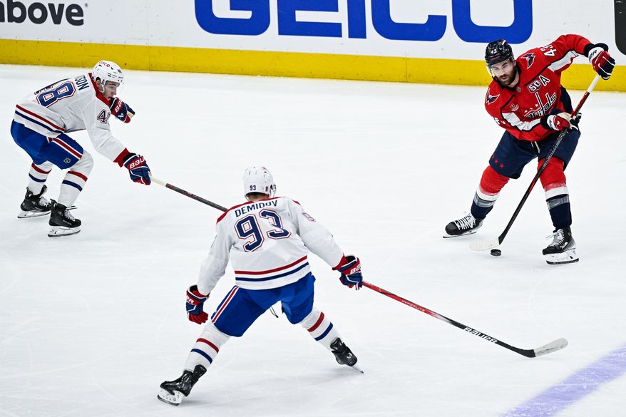 Washington Capitals right wing Tom Wilson (43) makes a between-the-legs pass to a trailing teammate against the Montreal Canadiens at Capital One Arena, Washington, D.C., April 30, 2025. (Photo by Brian Murphy for the Washington Times)