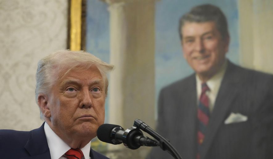 President Donald Trump speaks before Steve Witkoff is sworn as special envoy during a ceremony in the Oval Office of the White House, Tuesday, May 6, 2025, in Washington, with a portrait of former President Ronald Reagan in the background. (AP Photo/Mark Schiefelbein)