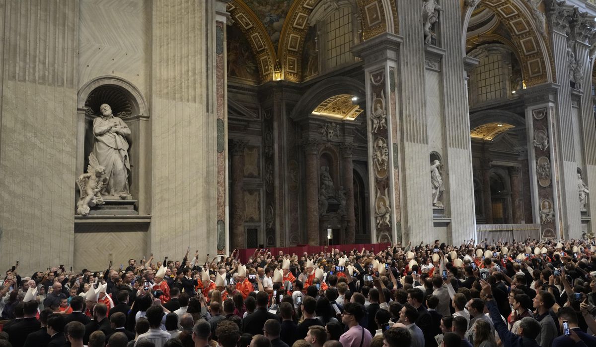 NextImg:The conclave to elect a new pope officially begins as the doors to the Sistine Chapel close