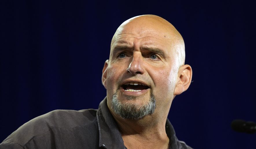 Sen. John Fetterman, D-Pa., speaks ahead of Democratic vice presidential candidate Minnesota Gov. Tim Walz during a campaign event in York, Pa, Oct. 2, 2024. (AP Photo/Matt Rourke, File)