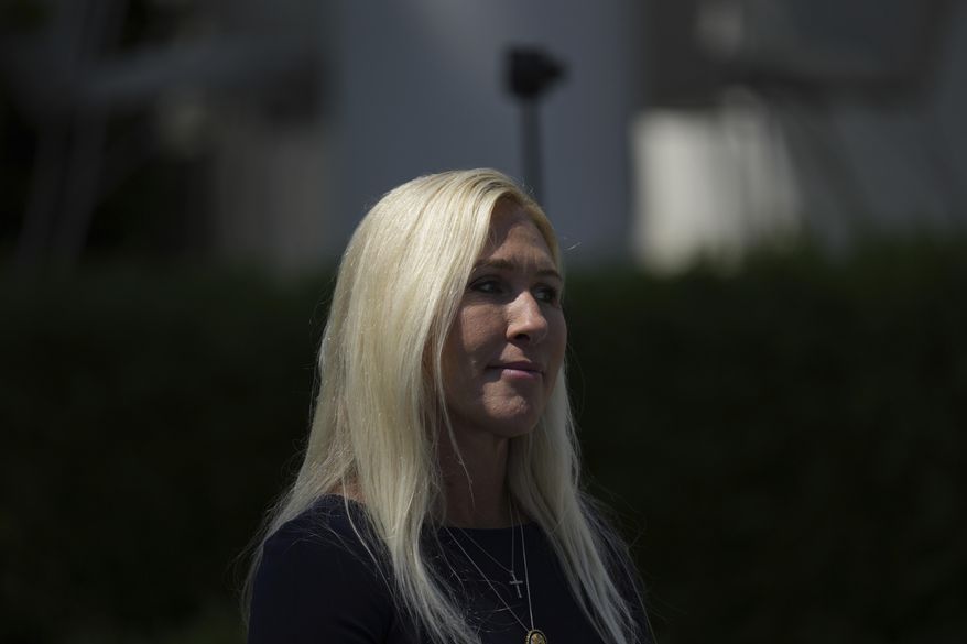 Rep. Marjorie Taylor-Greene, R-Ga., arrives for a National Day of Prayer event in the Rose Garden of the White House, Thursday, May 1, 2025, in Washington. (AP Photo/Alex Brandon)