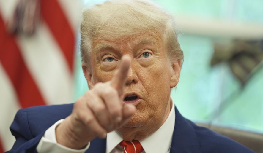 President Donald Trump gestures as he speaks with reporters after announcing a trade deal with United Kingdom in the Oval Office of the White House, Thursday, May 8, 2025, in Washington. (AP Photo/Evan Vucci)