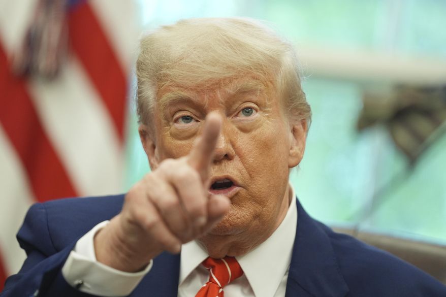 President Donald Trump gestures as he speaks with reporters after announcing a trade deal with United Kingdom in the Oval Office of the White House, Thursday, May 8, 2025, in Washington. (AP Photo/Evan Vucci)