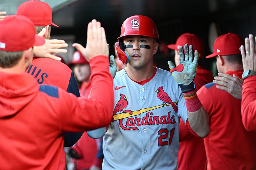 St. Louis Cardinals left fielder Lars Nootbaar (21) getting congratulated in the dugout after scoring on Willson Contreras’s double during the first inning of an MLB game against the Washington Nationals at Nationals Park in Washington D.C., May 9, 2025. (Photo by All-Pro Reels for Washington Times Sports)