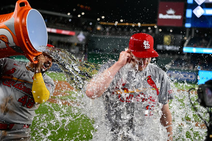 St. Louis Cardinals starting pitcher Erick Fedde (12) getting doused with water after throwing a complete game, six-hit shutout over the Washington Nationals at Nationals Park in Washington D.C., May 9, 2025. (Photo by All-Pro Reels for Washington Times Sports)