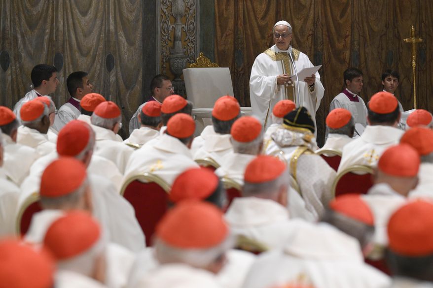 Newly elected Pope Leo XIV concelebrates Mass with the College of Cardinals inside the Sistine Chapel at the Vatican the day after his election as 267th pontiff of the Roman Catholic Church, Friday, May 9, 2025. (Vatican Media via AP)