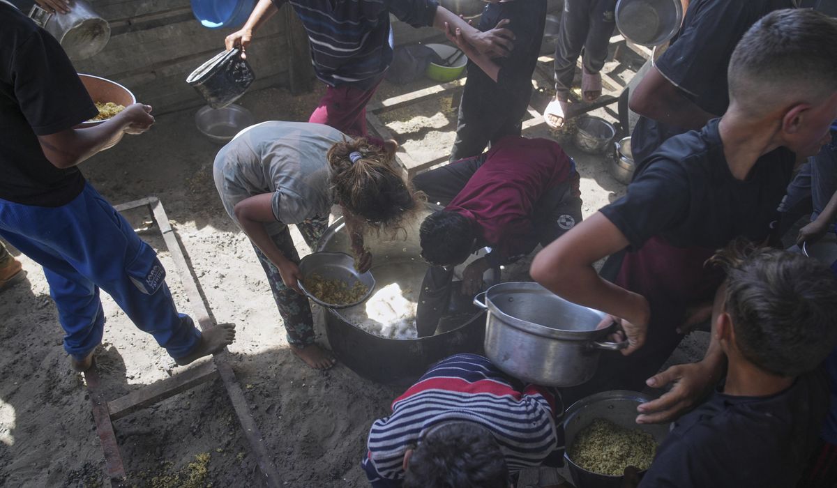 NextImg:Israeli airstrikes kill 23 in Gaza as outcry over aid blockade grows