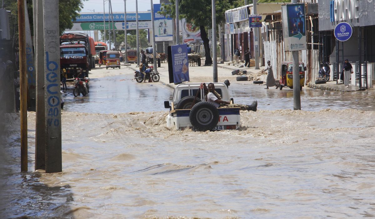 NextImg:At least seven people die as heavy rains leave waist-high floodwaters in Somalia’s capital