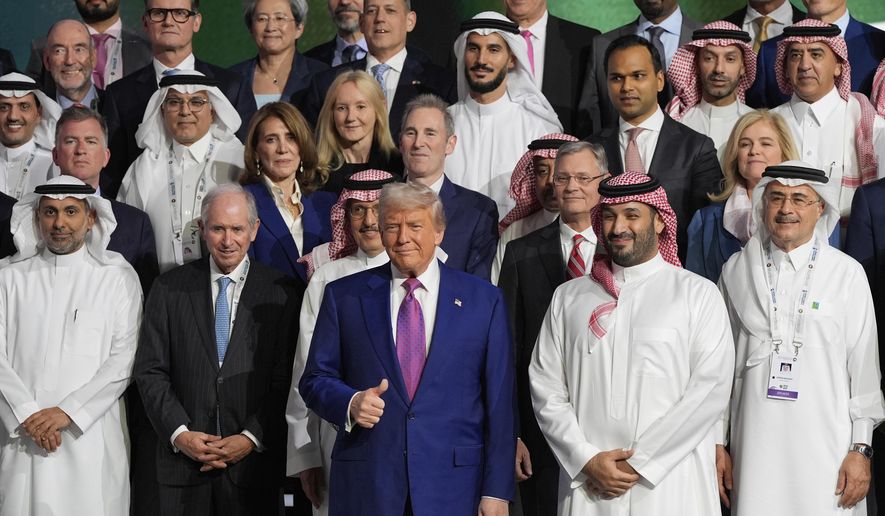 President Donald Trump and Saudi Crown Prince Mohammed bin Salman pose for a photo at the Saudi-U.S. Investment Forum at the King Abdulaziz International Conference Center in Riyadh, Saudi Arabia, Tuesday, May 13, 2025. (AP Photo/Alex Brandon)