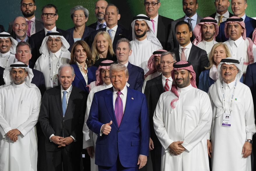 President Donald Trump and Saudi Crown Prince Mohammed bin Salman pose for a photo at the Saudi-U.S. Investment Forum at the King Abdulaziz International Conference Center in Riyadh, Saudi Arabia, Tuesday, May 13, 2025. (AP Photo/Alex Brandon)