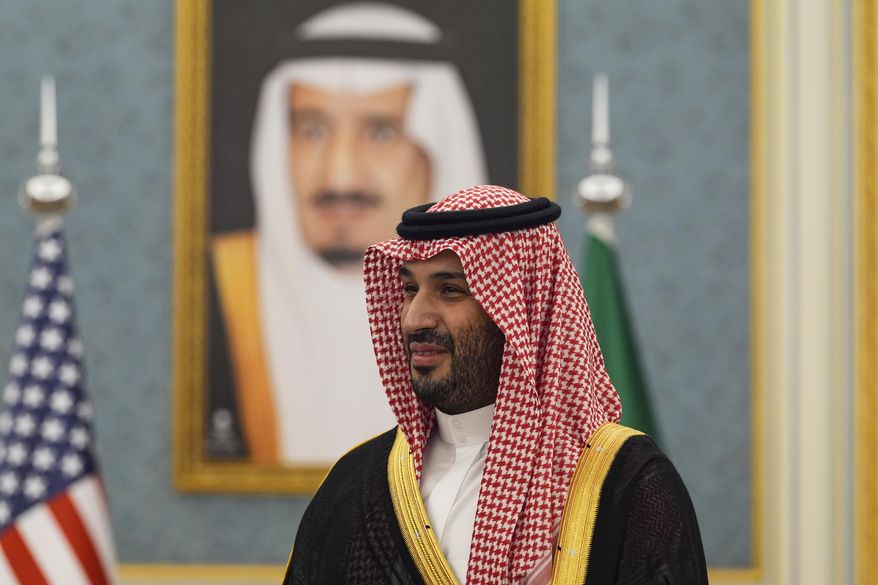 Saudi Crown Prince Mohammed bin Salman joins President Donald Trump to greet delegations at the Royal Palace in Riyadh, Saudi Arabia, Tuesday, May 13, 2025. (AP Photo/Alex Brandon/File)