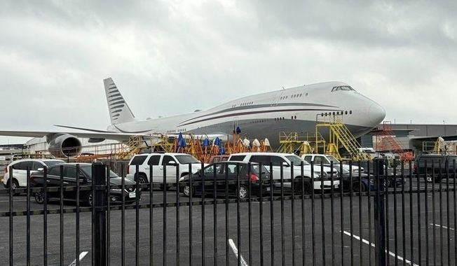 FILE - A Boeing 747 with the color scheme of planes used by the Qatari royal family is seen Friday, May 2, 2025 at San Antonio International Airport in San Antonio, Texas. President Donald Trump said this week that he wants to accept the $400 million plane, and that it would later be donated to a presidential library. (Brandon Lingle/The San Antonio Express-News via AP, File)