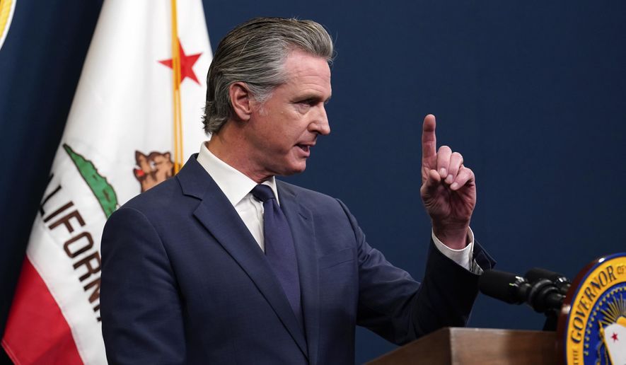 CORRECTS BUDGET DATES Calif. Gov. Gavin Newsom presents his revised 2025-2026 state budget during a news conference in Sacramento, Calif., Wednesday, May 14, 2025. (AP Photo/Rich Pedroncelli)