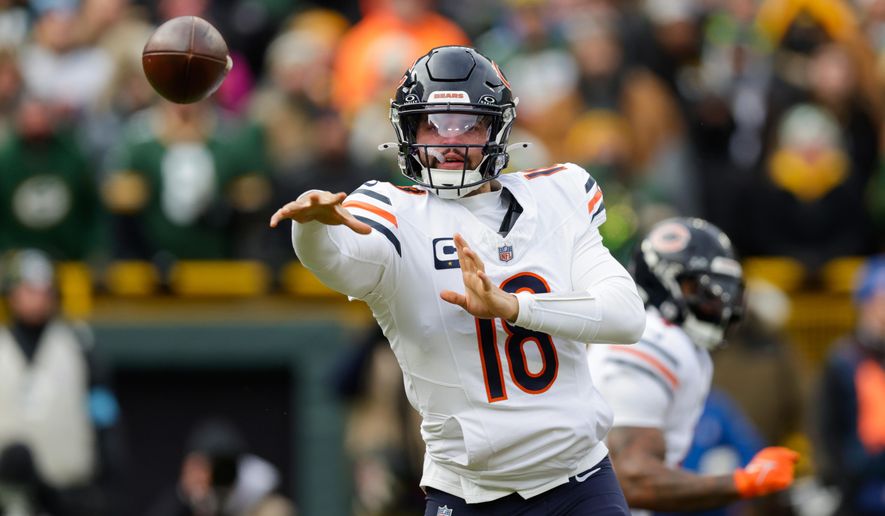 FILE - Chicago Bears quarterback Caleb Williams (18) throws a pass during an NFL football game between the Green Bay Packers and Chicago Bears Sunday, Jan. 5, 2025, in Green Bay, Wis. (AP Photo/Matt Ludtke, File)
