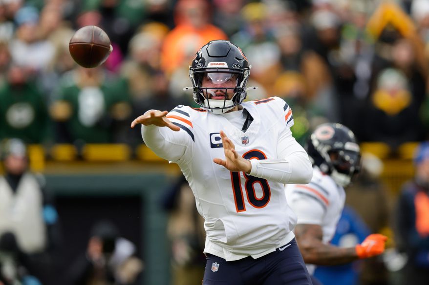 FILE - Chicago Bears quarterback Caleb Williams (18) throws a pass during an NFL football game between the Green Bay Packers and Chicago Bears Sunday, Jan. 5, 2025, in Green Bay, Wis. (AP Photo/Matt Ludtke, File)