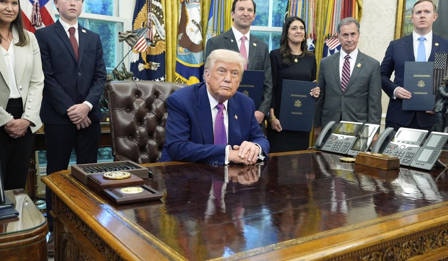 President Donald Trump speaks with reporters in the Oval Office of the White House, Friday, May 9, 2025, in Washington. (AP Photo/Alex Brandon)