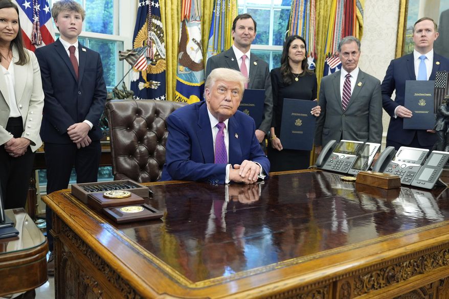 President Donald Trump speaks with reporters in the Oval Office of the White House, Friday, May 9, 2025, in Washington. (AP Photo/Alex Brandon)