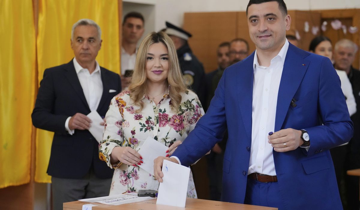 NextImg:Romanians vote in a tense presidential runoff that pits nationalist against pro-EU centrist