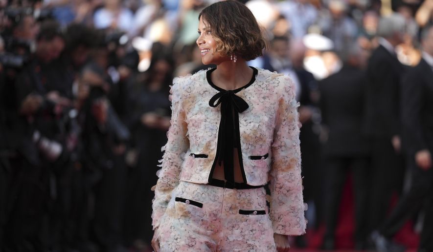 Jury member Halle Berry poses for photographers upon arrival at the premiere of the film 'The Phoenician Scheme' at the 78th international film festival, Cannes, southern France, Sunday, May 18, 2025. (AP Photo/Natacha Pisarenko)