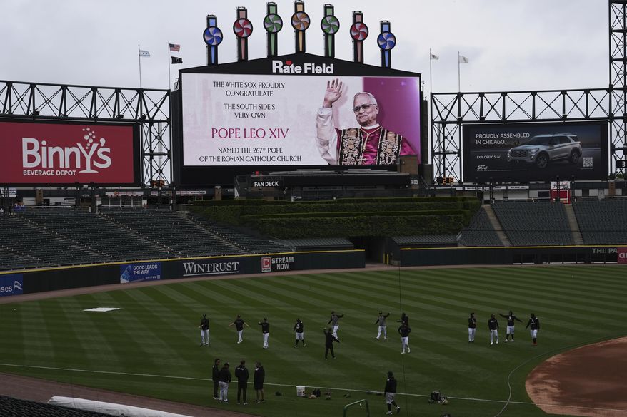 The Chicago White Sox team honors Pope Leo XIV on the scoreboard at Rate Field before a baseball game between the Seattle Mariners and the Chicago White Sox in Chicago, Monday, May 19, 2025. (AP Photo/Nam Y. Huh) ** FIEL **